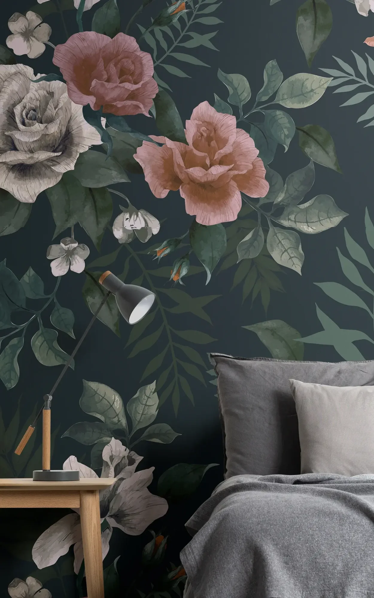  A serene bedroom setting with a dark teal floral wallpaper adorned with large roses in shades of pink and grey. 