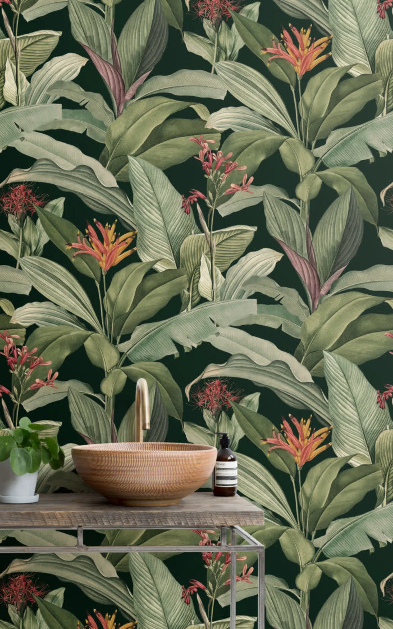  A vivid botanical wallpaper with rich green hues and exotic flowers provides a lush backdrop to a modern bathroom setup, featuring a rustic wooden vanity and minimalist decor for a fresh, natural aesthetic.