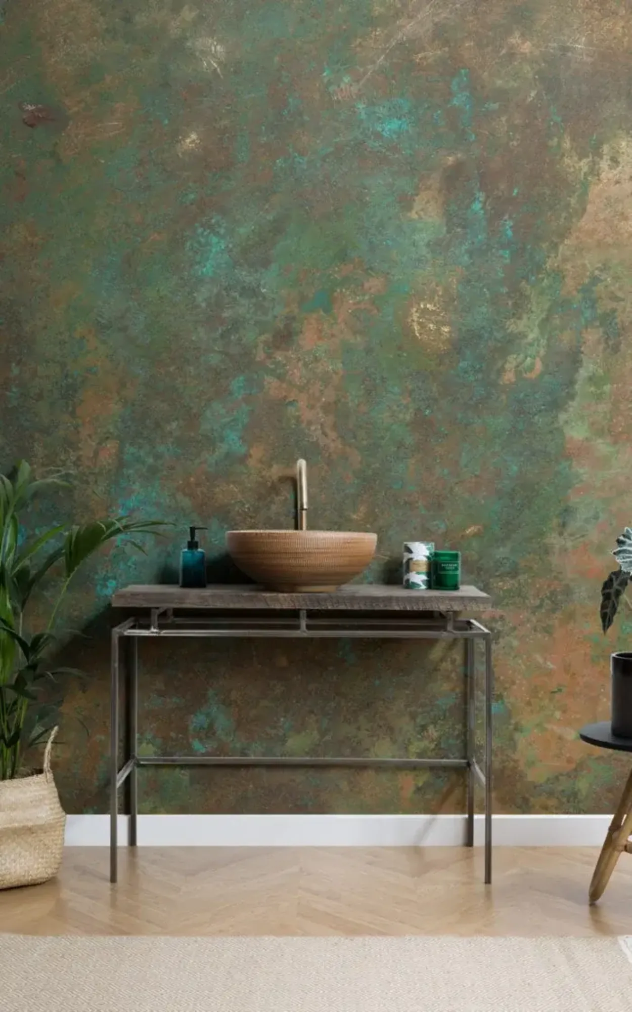 Bathroom with rusted metal effect wall mural, wooden washstand, and modern accessories.