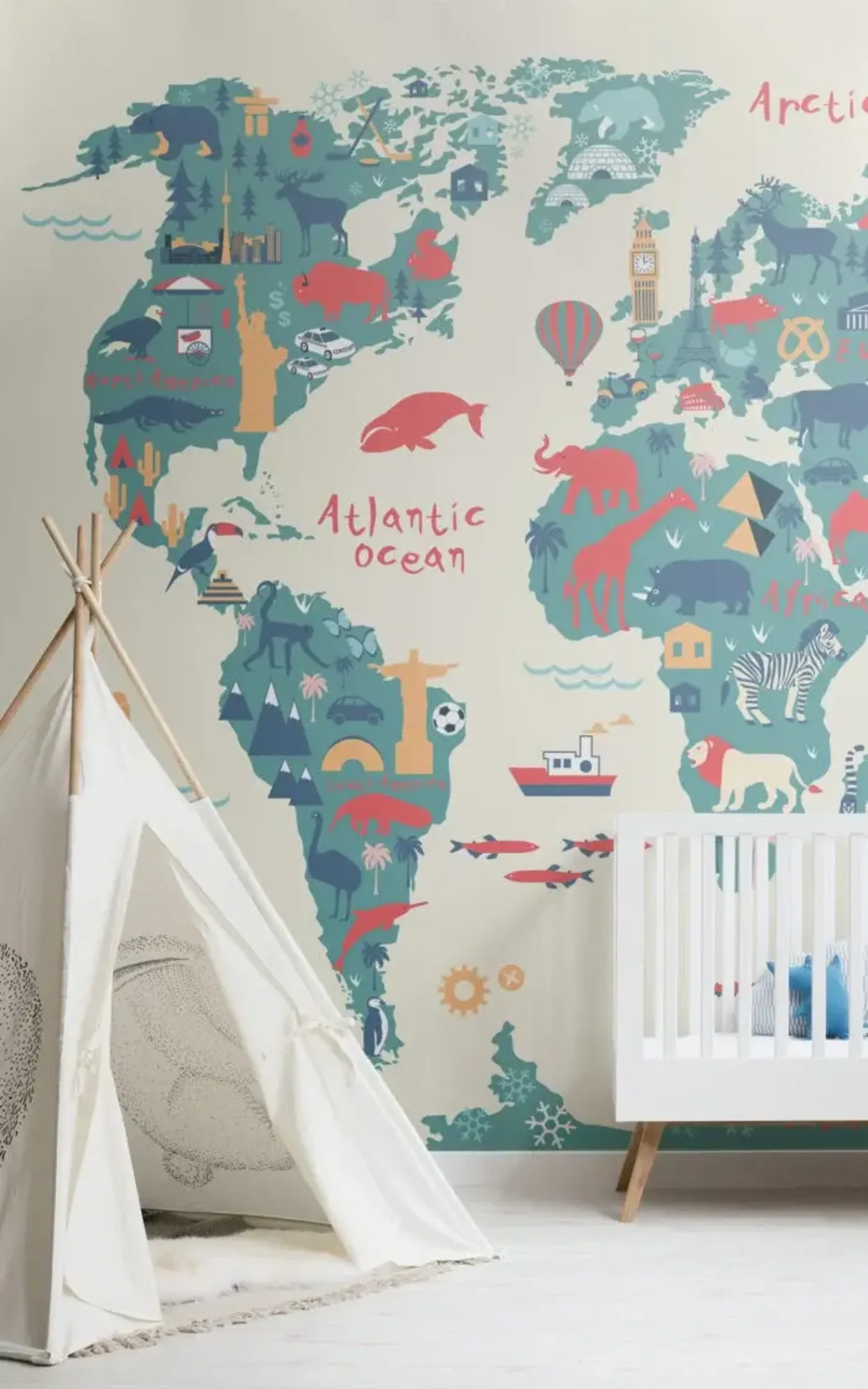 A children's room features a world map mural with colorful illustrations of animals, landmarks, and other cultural icons, a white crib, and a play tent.