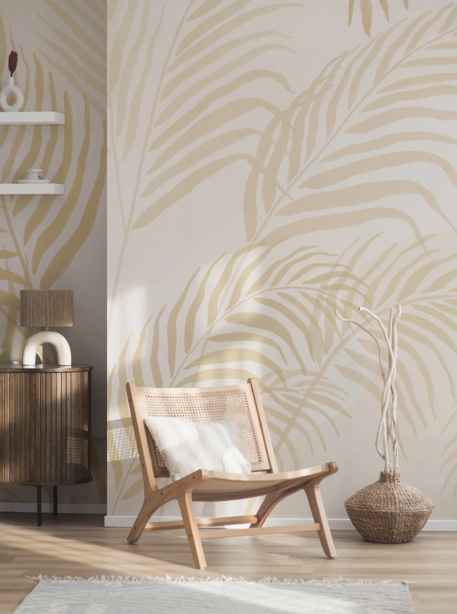 Bright room with oversized pale yellow palm leaf mural and a low wooden chair.