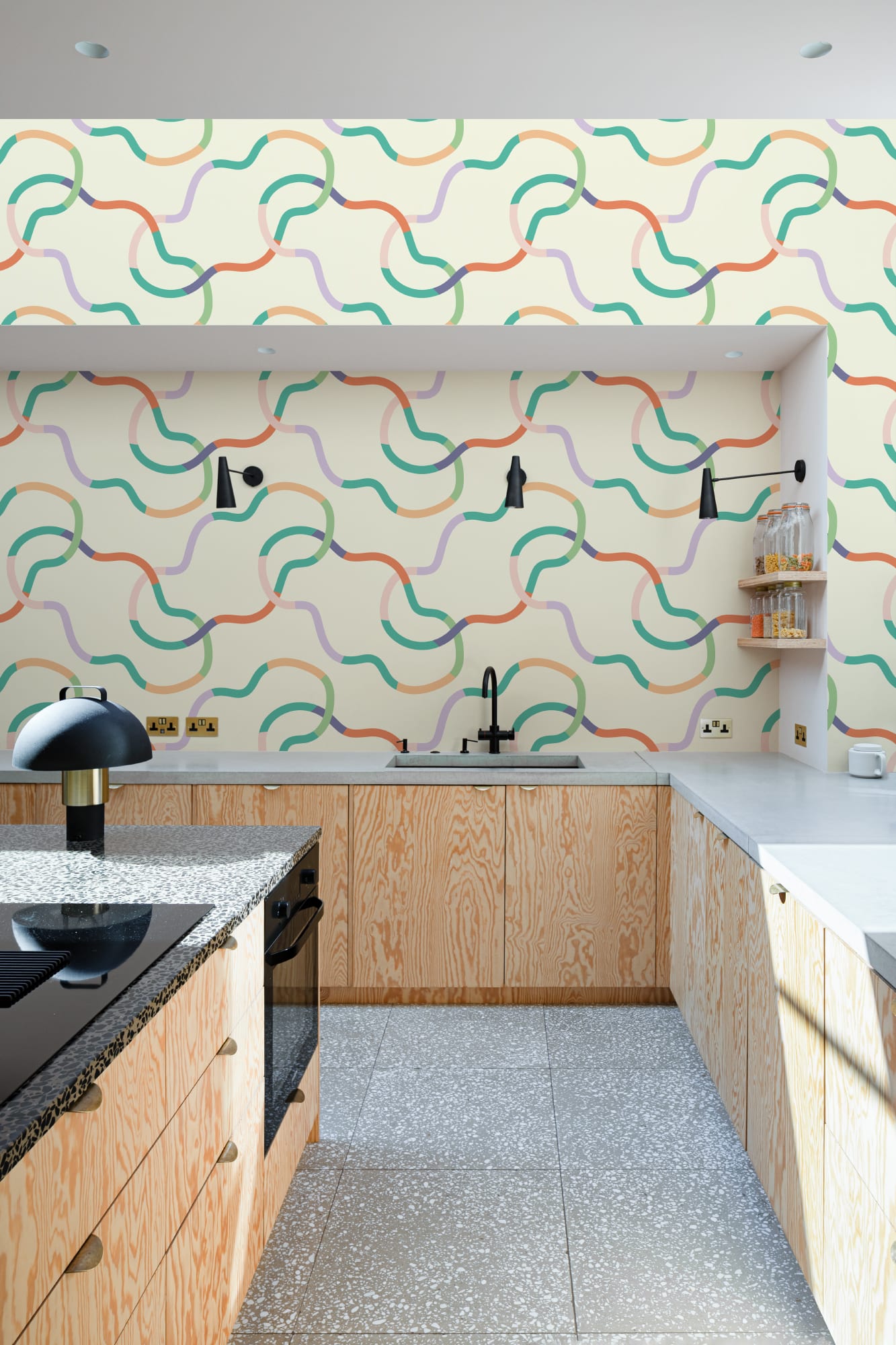 Modern kitchen with a light wood dining set and neutral abstract curved line wallpaper.