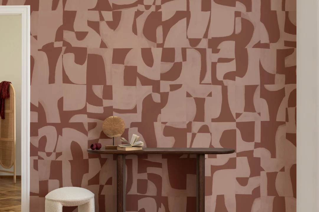 Carta da parati con motivi geometrici astratti in terracotta calda