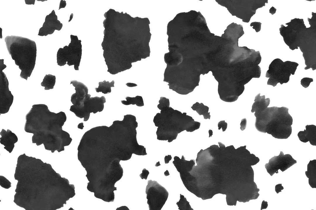 Painted Black and White Cow Print Repeat Pattern Wallpaper
