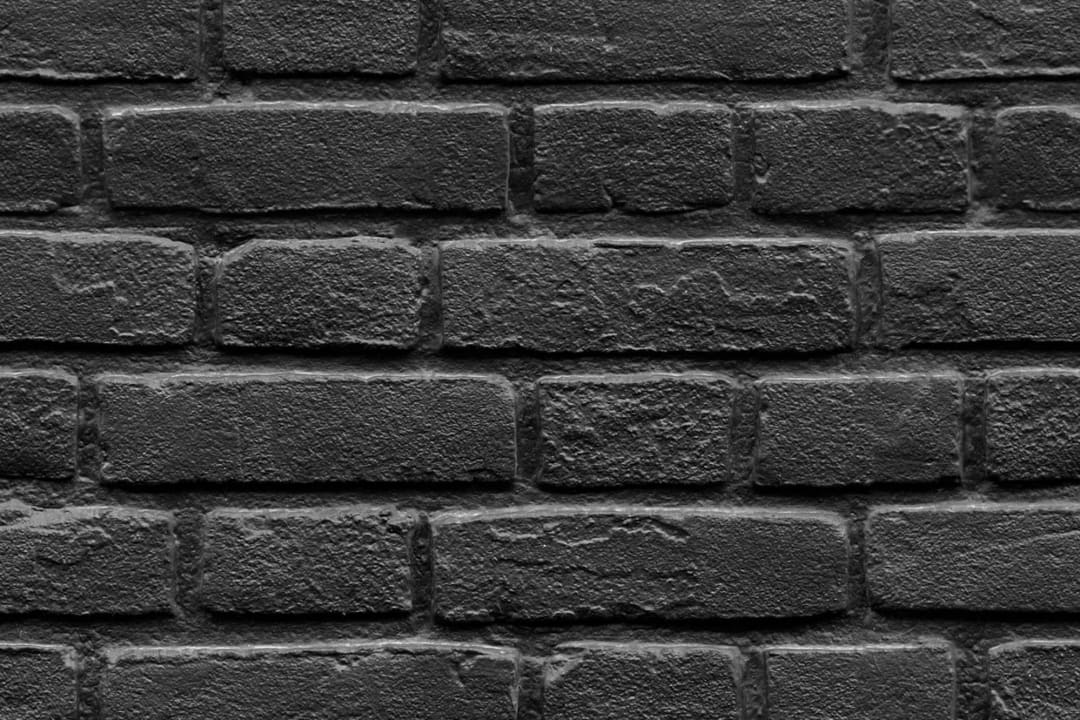 Black Painted Brick Effect Pattern Wallpaper Mural