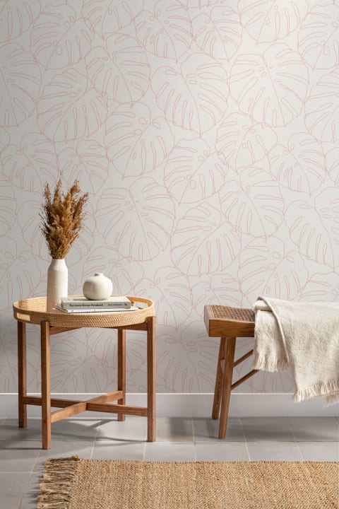 Carta da Parati Rosa con Motivo di Foglie di Monstera in Stile Minimal