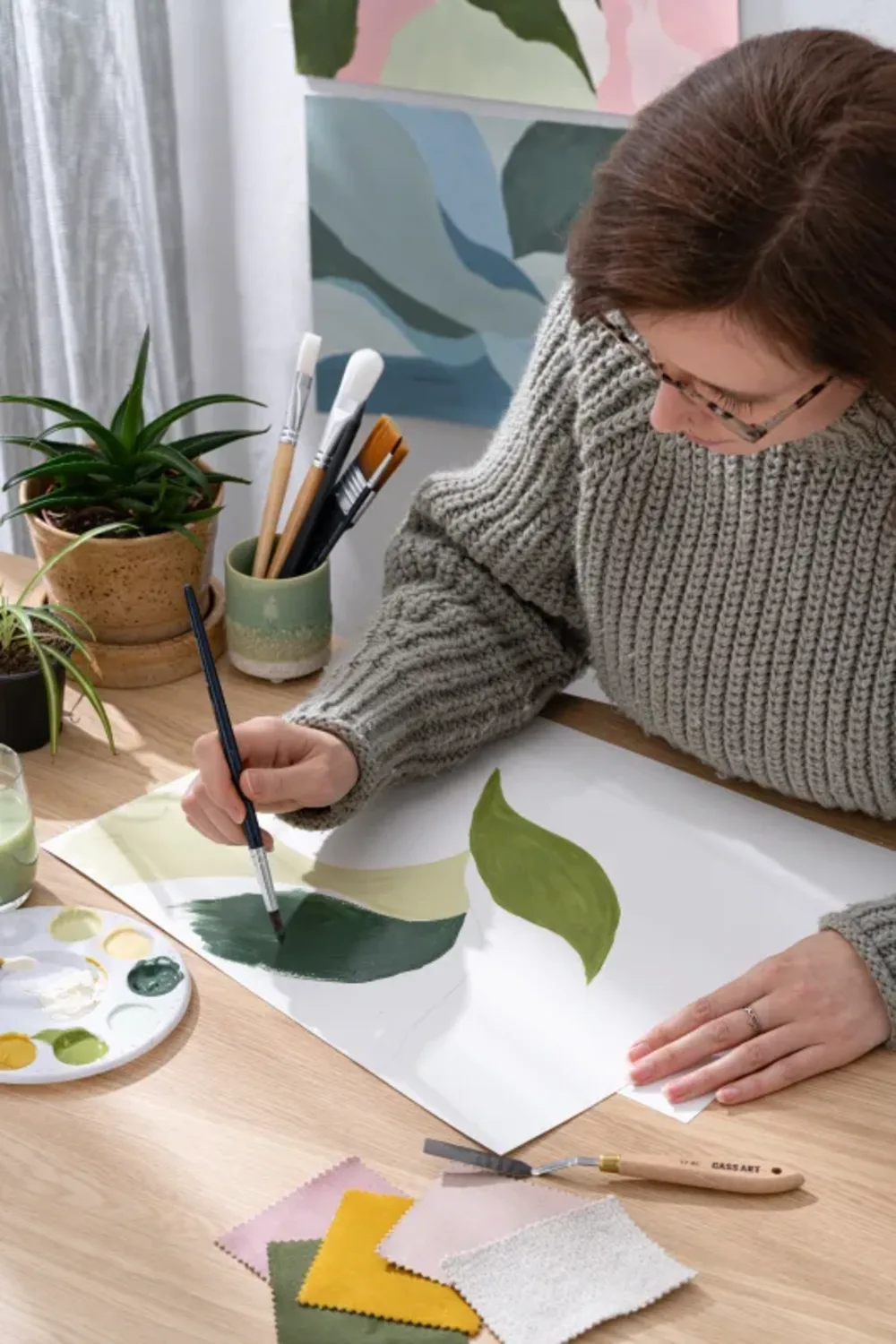 Peinture murale abstraite de feuilles en terre cuite