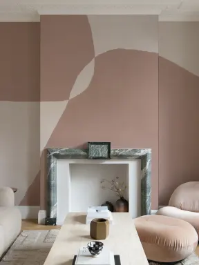 Papier peint panoramique moderne avec effet de plâtre et formes abstraites dans les tons roses