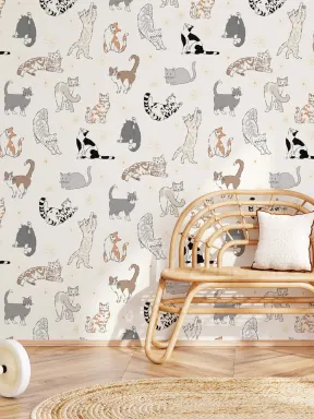Papier peint panoramique à motif de chats beige avec un charme félin plein de malice