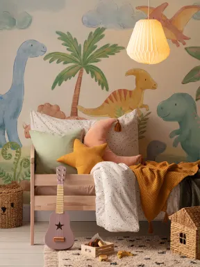 Papier peint panoramique multicolore Dinosaur Paradise pour des espaces de jeu pleins de fantaisie