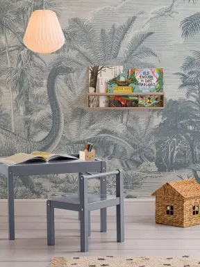 Murales de papel pintado infantil de dinosaurios en paisaje prehistórico azul