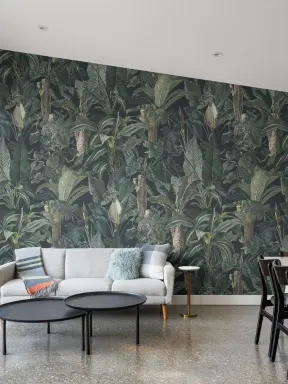 Papier peint panoramique sur les plantes tropicales sombres et feuillues