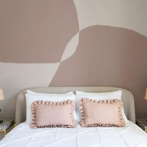 Modern Plaster-Effect Abstract Shapes Wall Mural in Pink Tones
