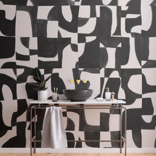 Moderne zwarte abstracte muurschildering met handgesneden vormen en structuureffect