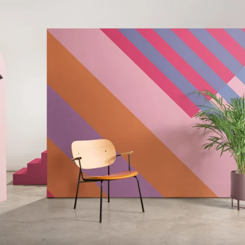 Różowo-pomarańczowa fototapeta w odważne geometryczne pasy